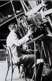 Edwin Hubble observing on the 100-inch telescope. Image courtesy of the Observatories of the Carnegie Institution for Science.
