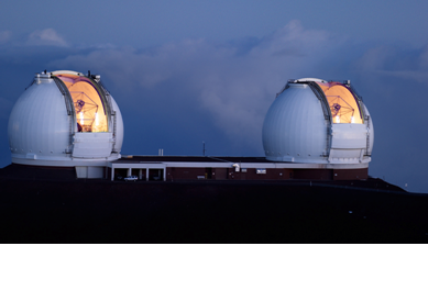 The twin 10-meter Keck telescope domes on Mauna Kea, Hawaii. Image courtesy o fthe W.M. Keck Observatory.